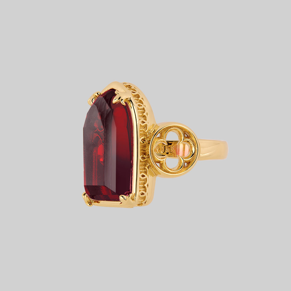 gothic cathedral arch red glass window gold ring