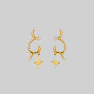 abstract waves star earrings gold