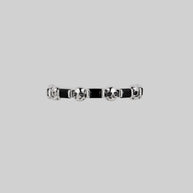 silver band ring skull black spinel