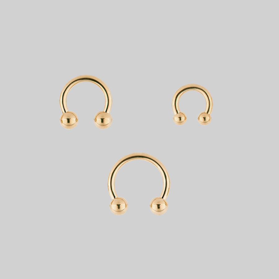 CLEO. Circular Titanium Barbell Ring - Gold Gold titanium barbell septum ring 1.6mm pack of three
