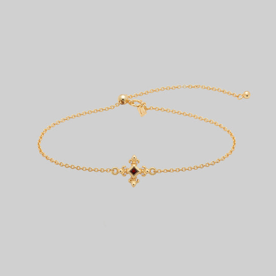 CRIMSON. Fleur de Lis Garnet Bracelet - Gold