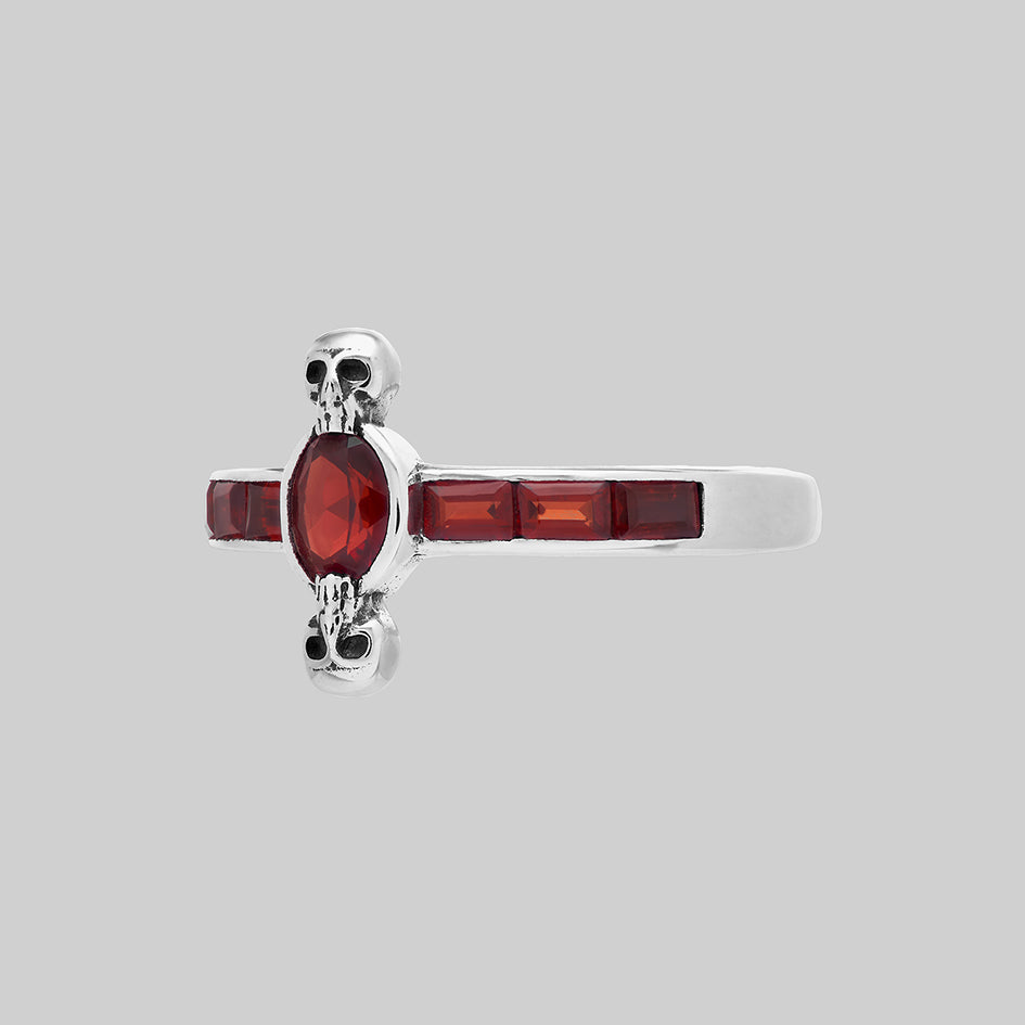 Silver gothic garnet gemstone skull ring