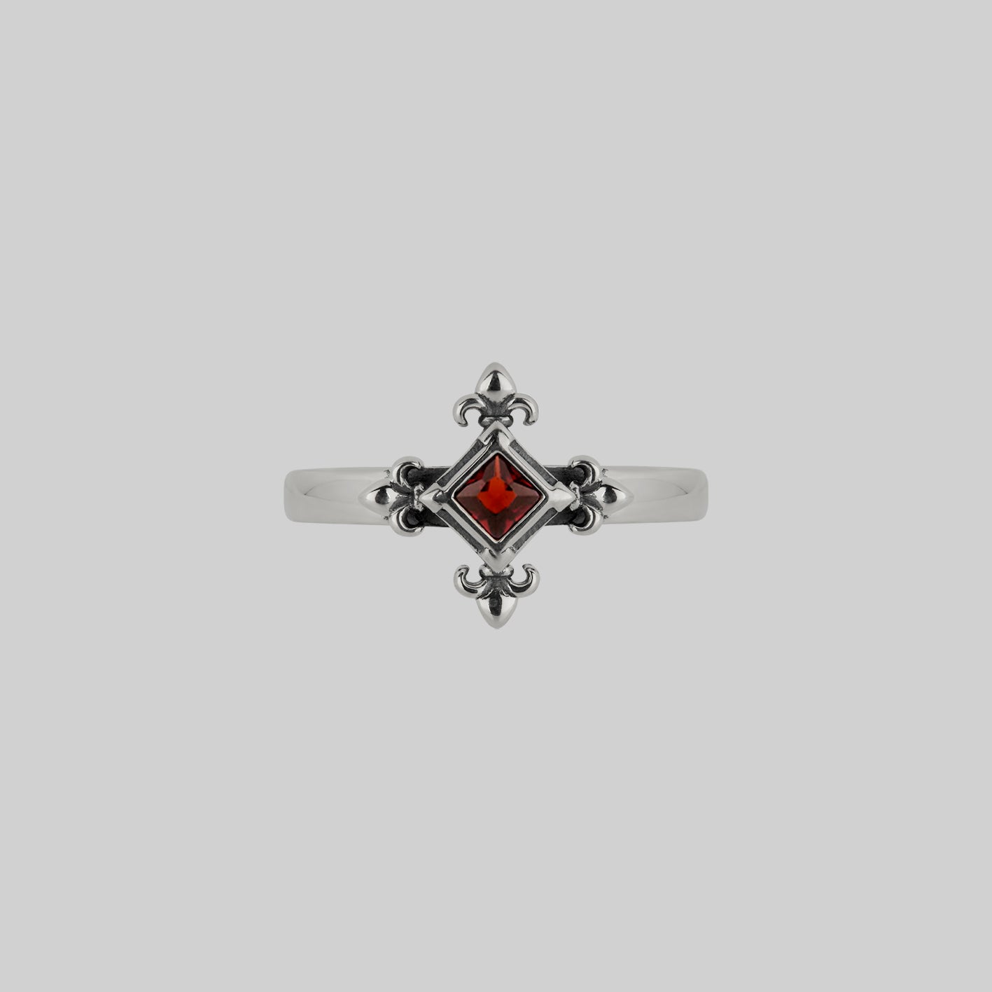 silver medieval fleur-de-lis garnet ring