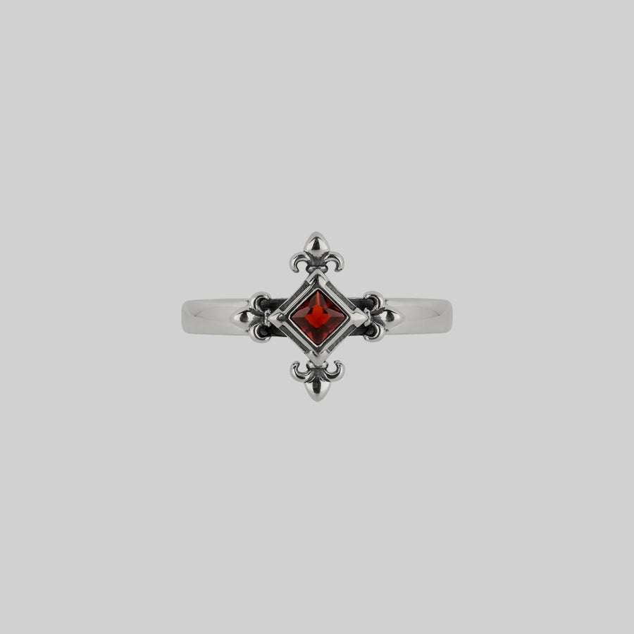 silver medieval fleur-de-lis garnet ring