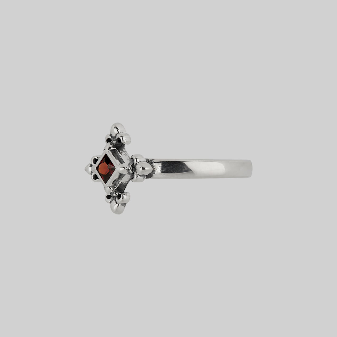 silver medieval fleur-de-lis garnet ring