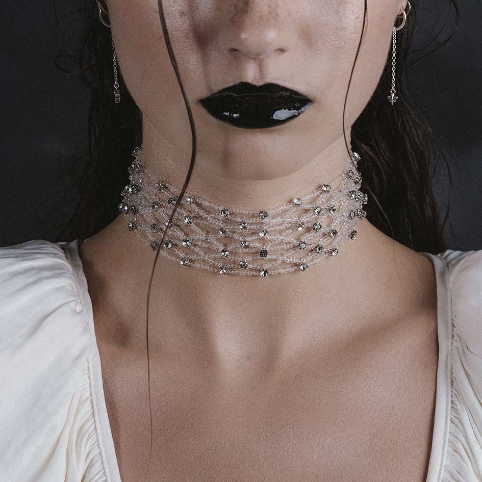Model wearing Elspeth white wide glass beaded choker
