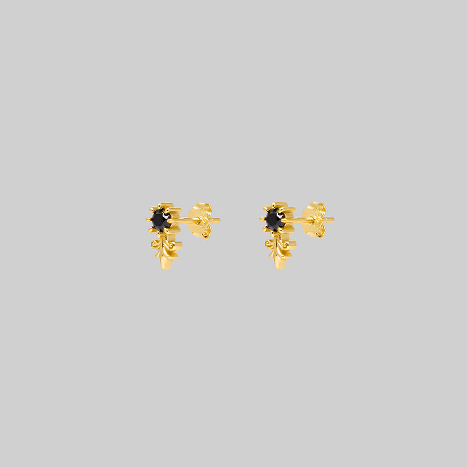 Fiora gold heraldic lily black onyx stud earrings, side view