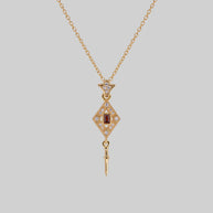 gatsby garnet and sword gold necklace