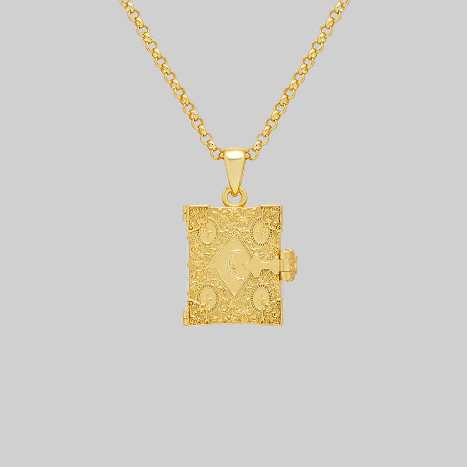 Gold book of spells locket necklace, closed, front view