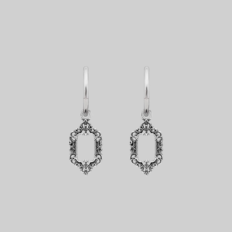 Silver ornate frame hoop earrings, shown as a pair