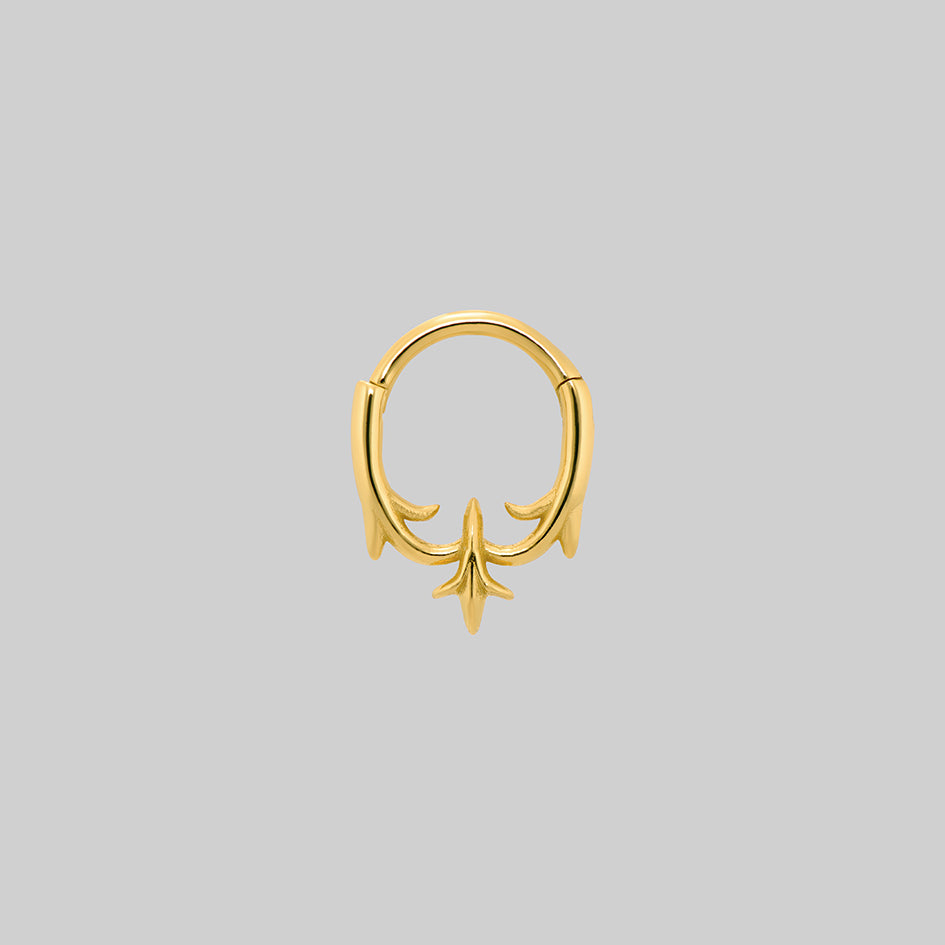 Hault gold heraldic lily septum clicker ring, clicker closed