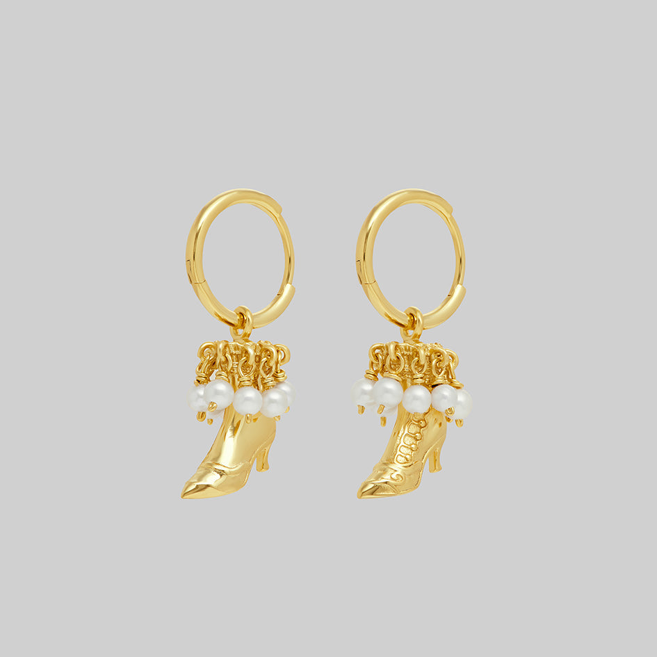 Gold witches boot pearl hoop earrings, pair, side view