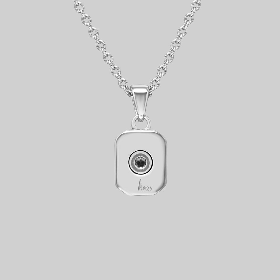 Back of the sterling silver Clear Quartz cremation pendant with a screw fastened ashes chamber and 925 stamp
