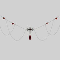 silver fleur-de-lis necklace with red gemstones