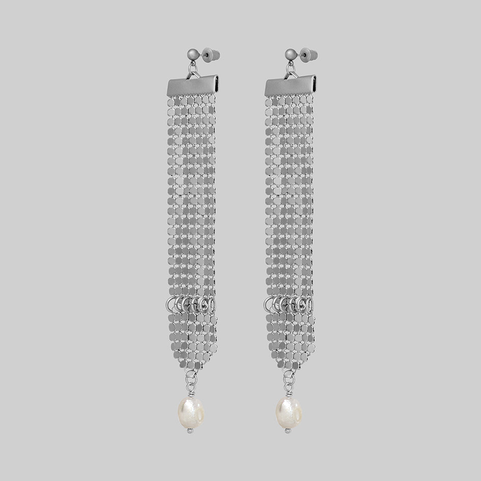 Oda silver armoured pearl drop earrings, side view