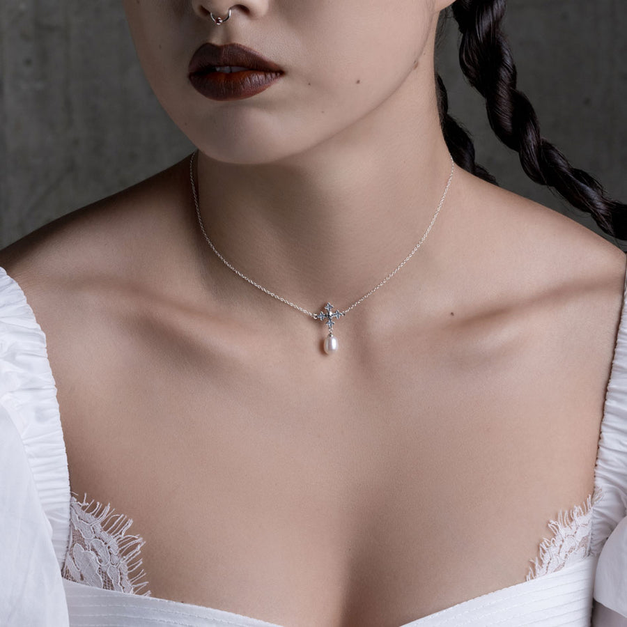 delicate sterling silver skull and cross pearl necklace