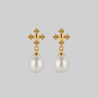 dainty pearl and skull stud earrings