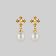 dainty pearl and skull stud earrings