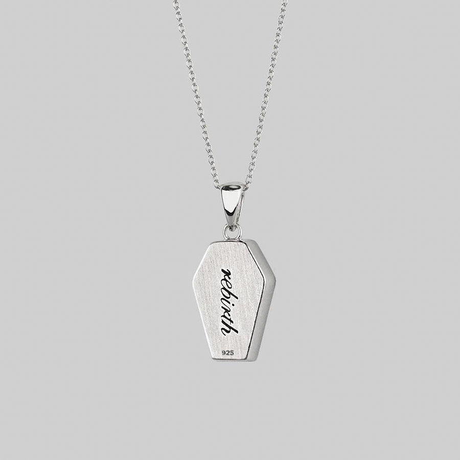 REBIRTH. Rose Under Glass Coffin Necklace - Silver silver necklace with coffin shaped pendant with 'rebirth' engraving