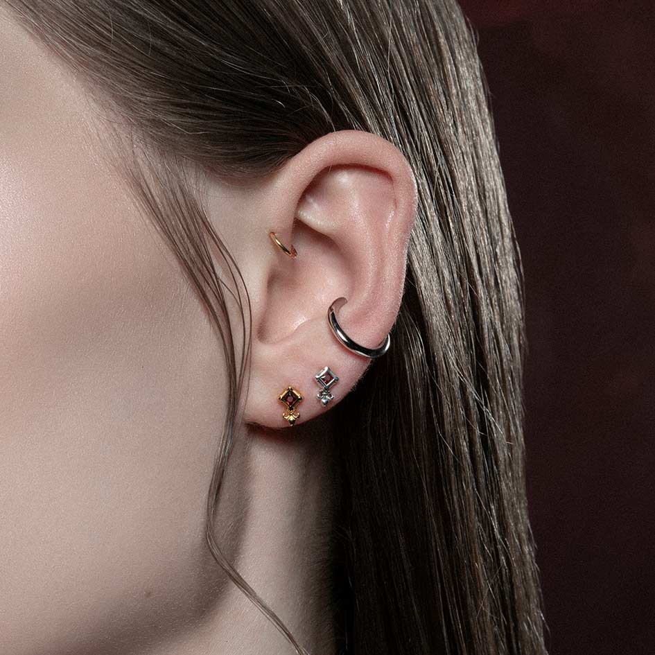 silver tiny fleur-de-lis garnet stud earrings