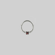 dainty cabochon garnet silver septum clicker ring