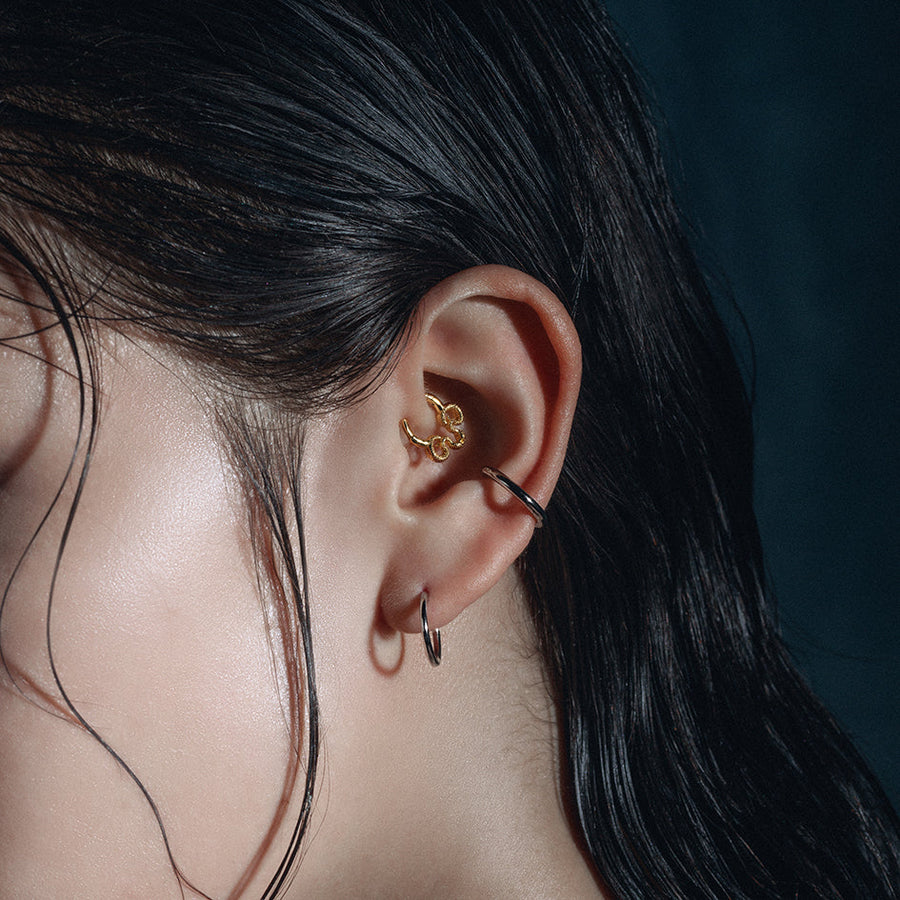 SERPENTINE. Sea Snake Bound Septum Clicker Ring - Gold dainty snake septum daith forward helix clicker ring gold