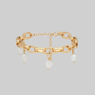 Gold link chain bracelet with pearl charms
