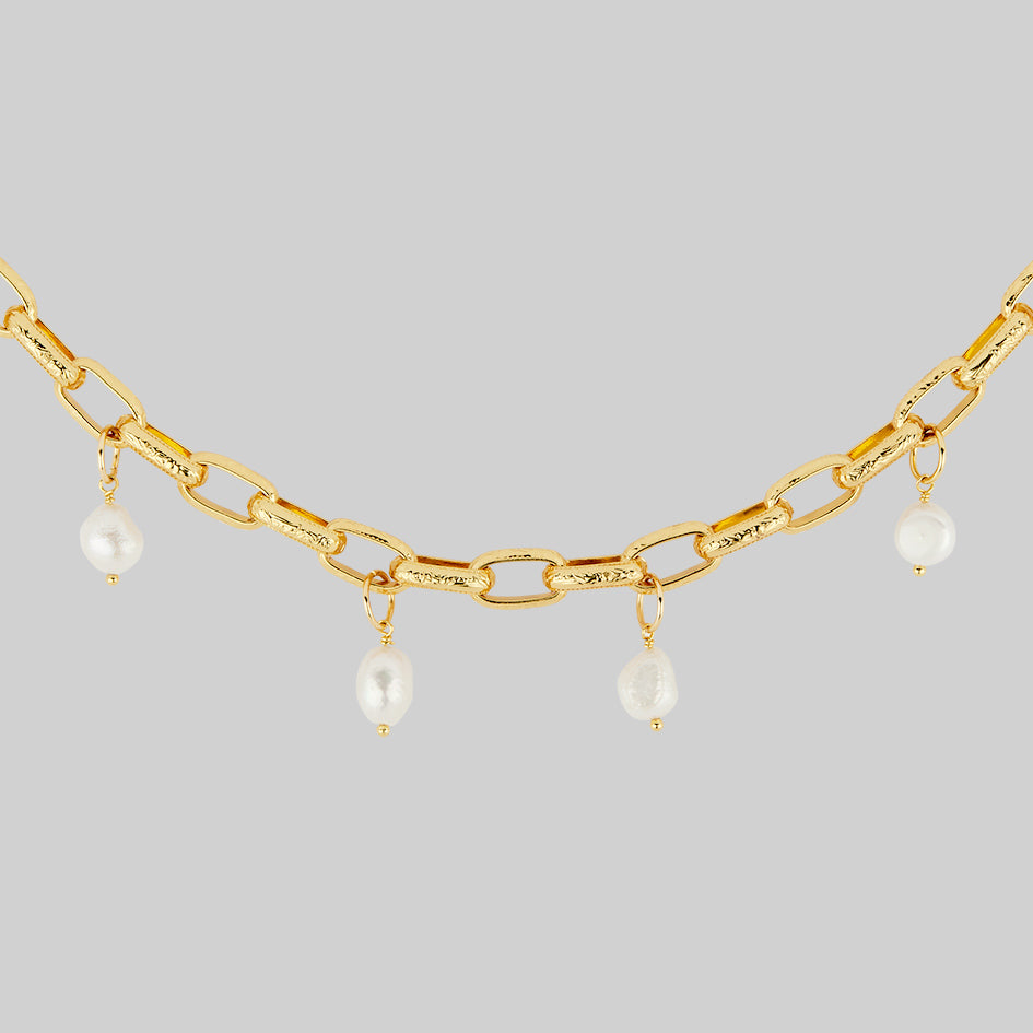 ornate gold plated chain necklace with ivory pearl drops