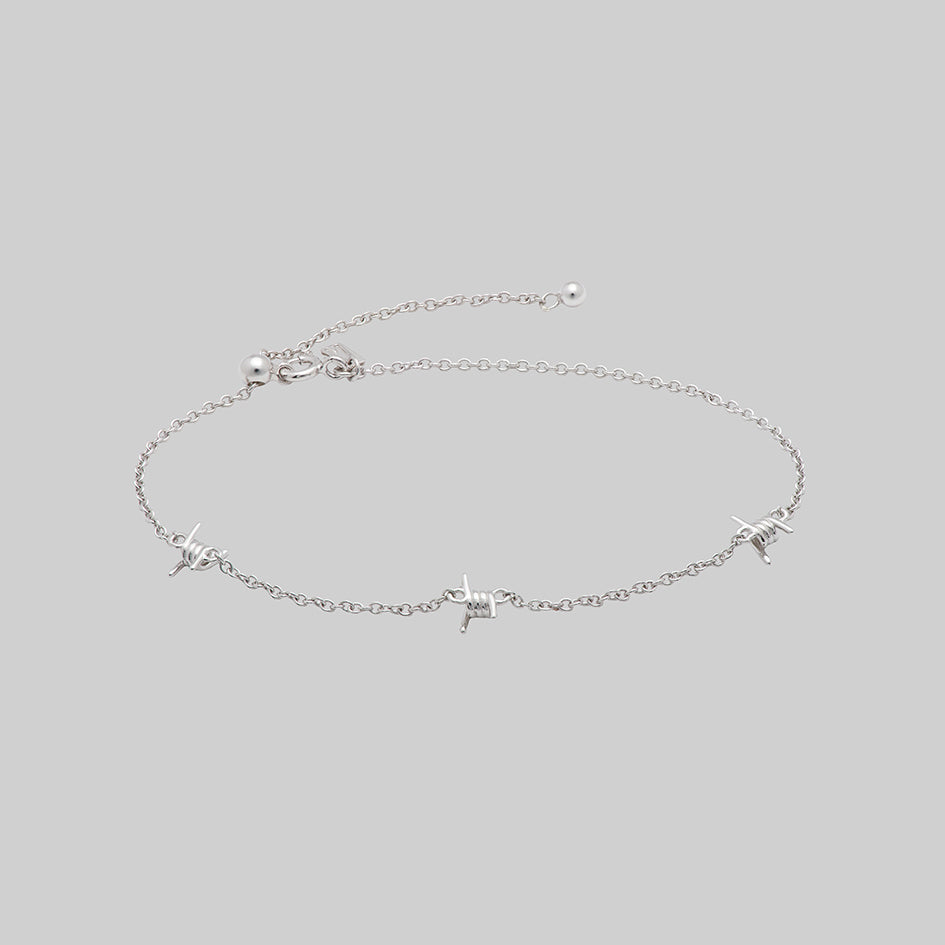 Dainty barbed wire charm bracelet