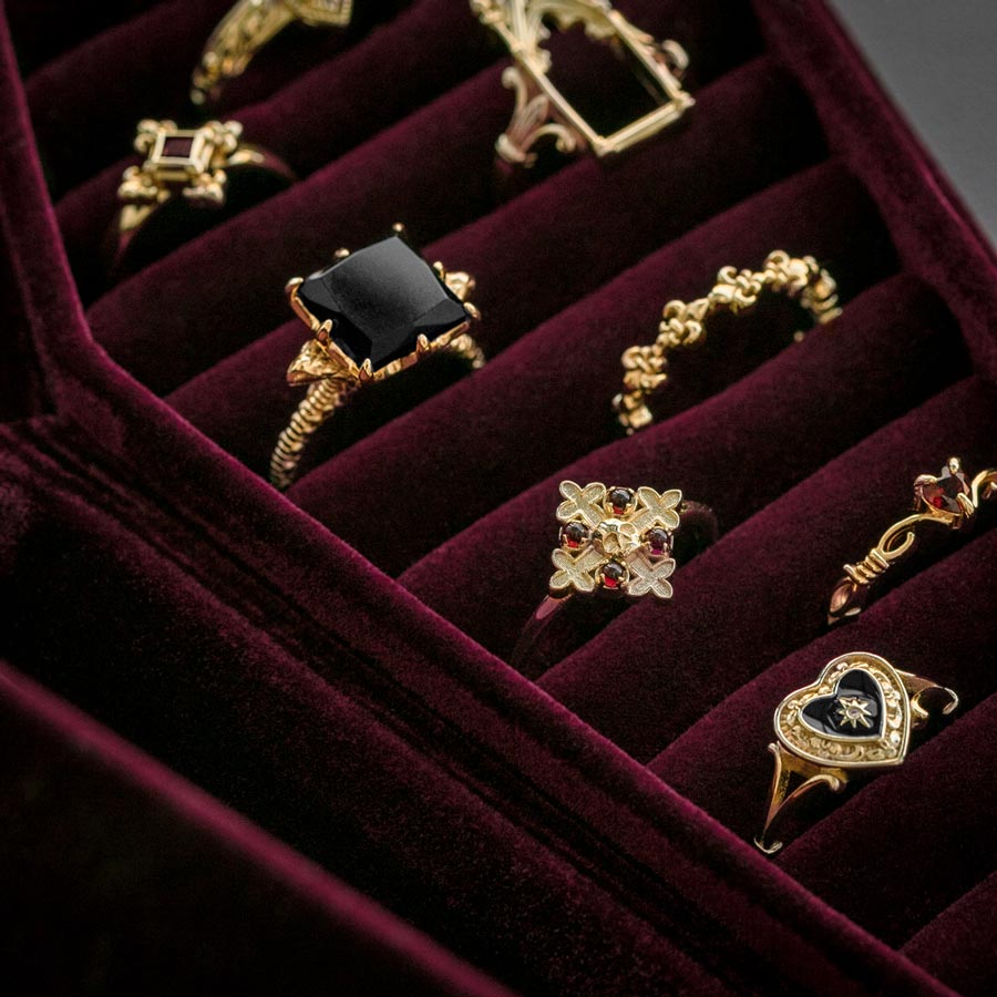 The Crimson Red Velvet Coffin Ring Case red velvet coffin ring case close up gold