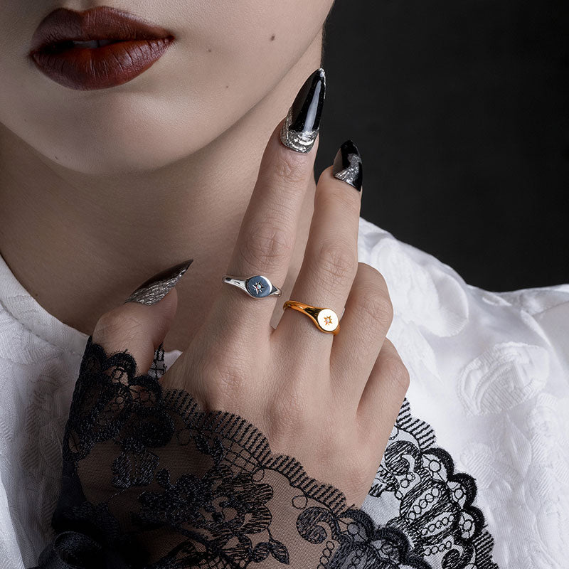 cabochon opal star set oval signet ring