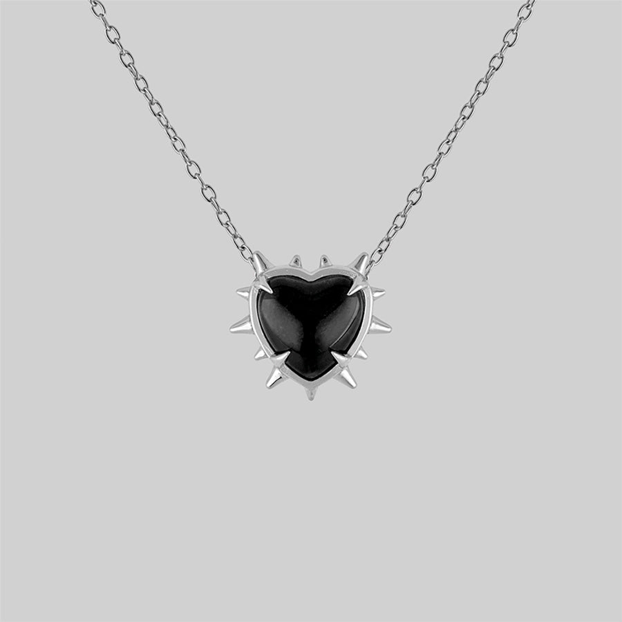 silver with black heart necklace