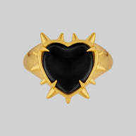 gold spike ring with black heart