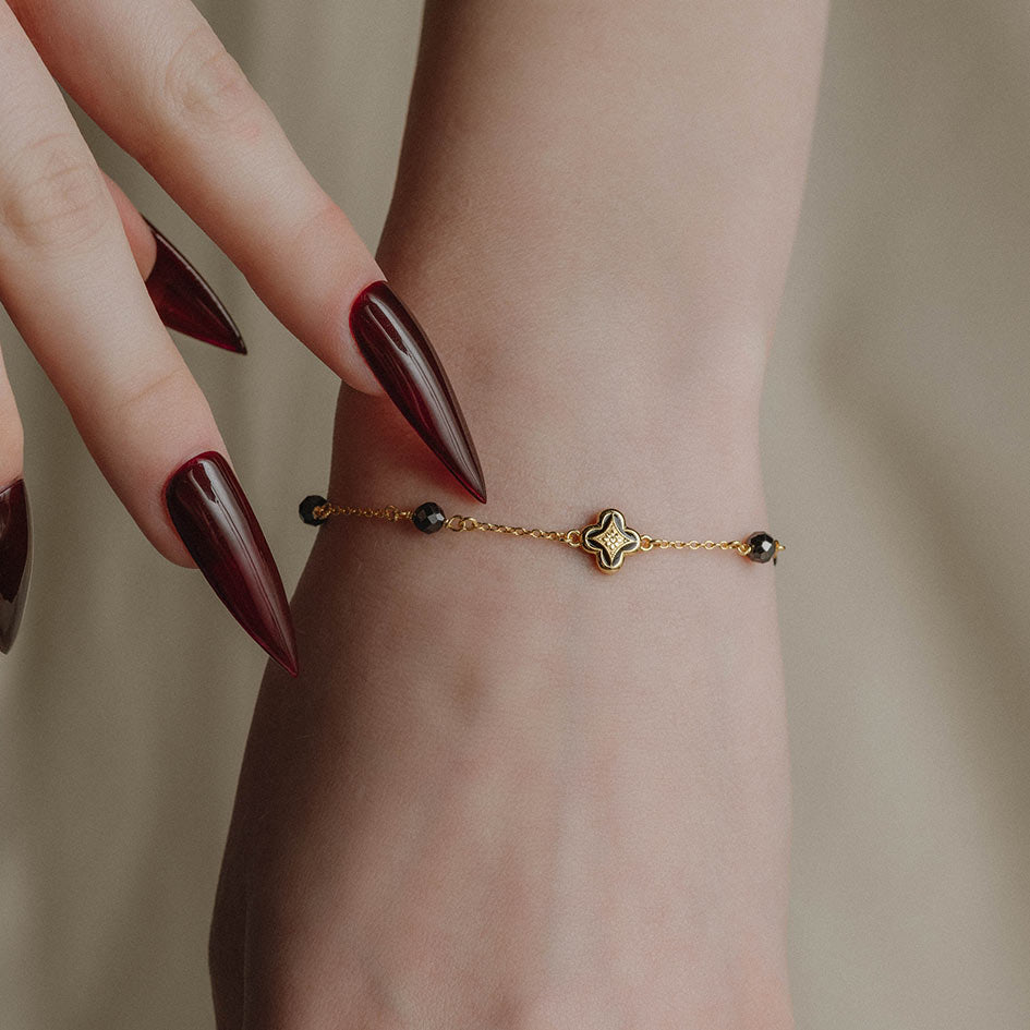 gold dainty black bead bracelet