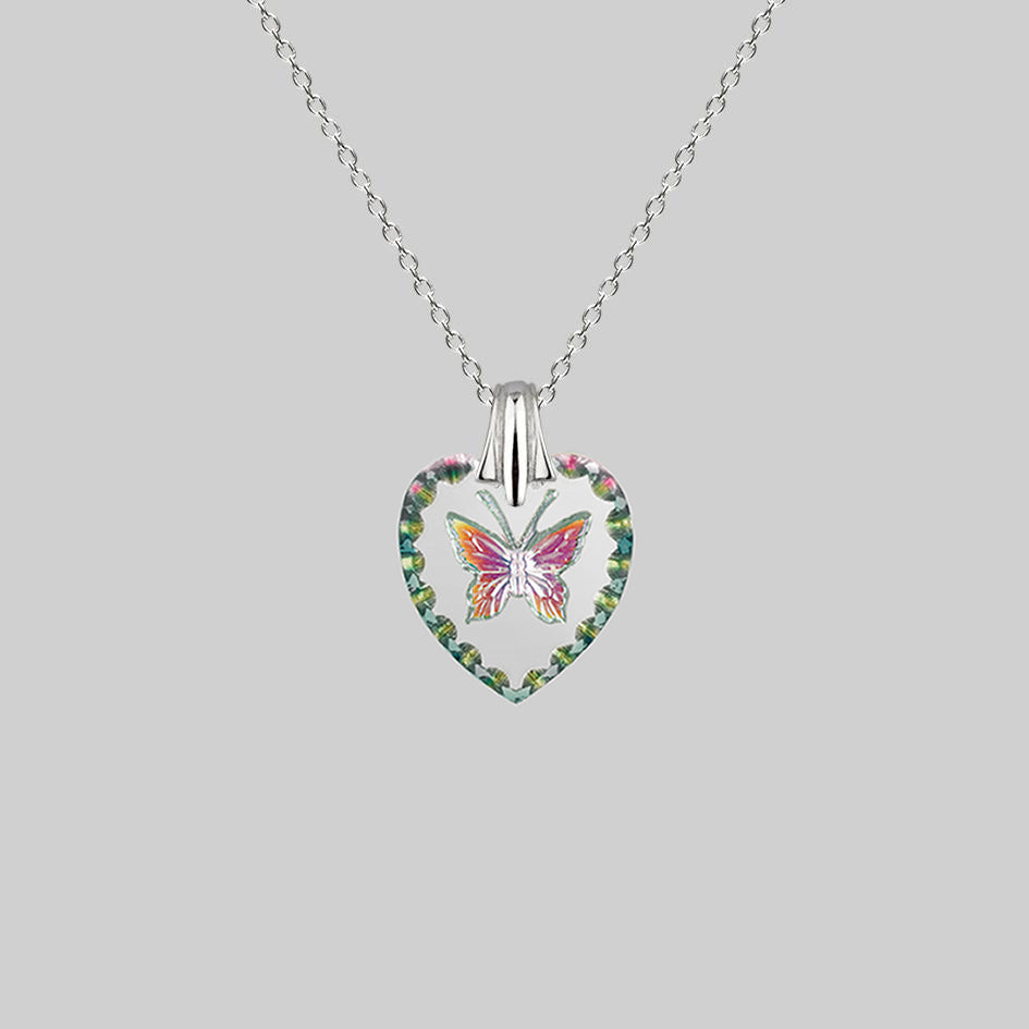 NEW DAWN. Butterfly Engraved Glass Heart Necklace - Silver