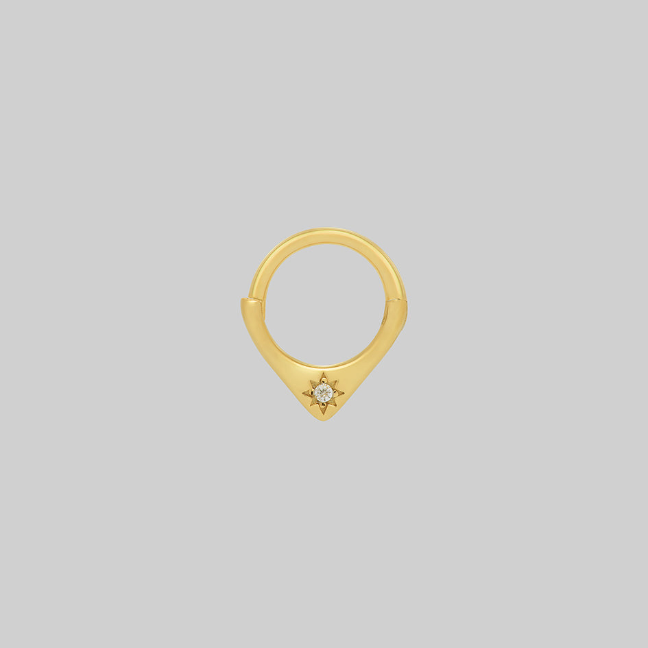 gold starburst clicker ring gothic septum piercing