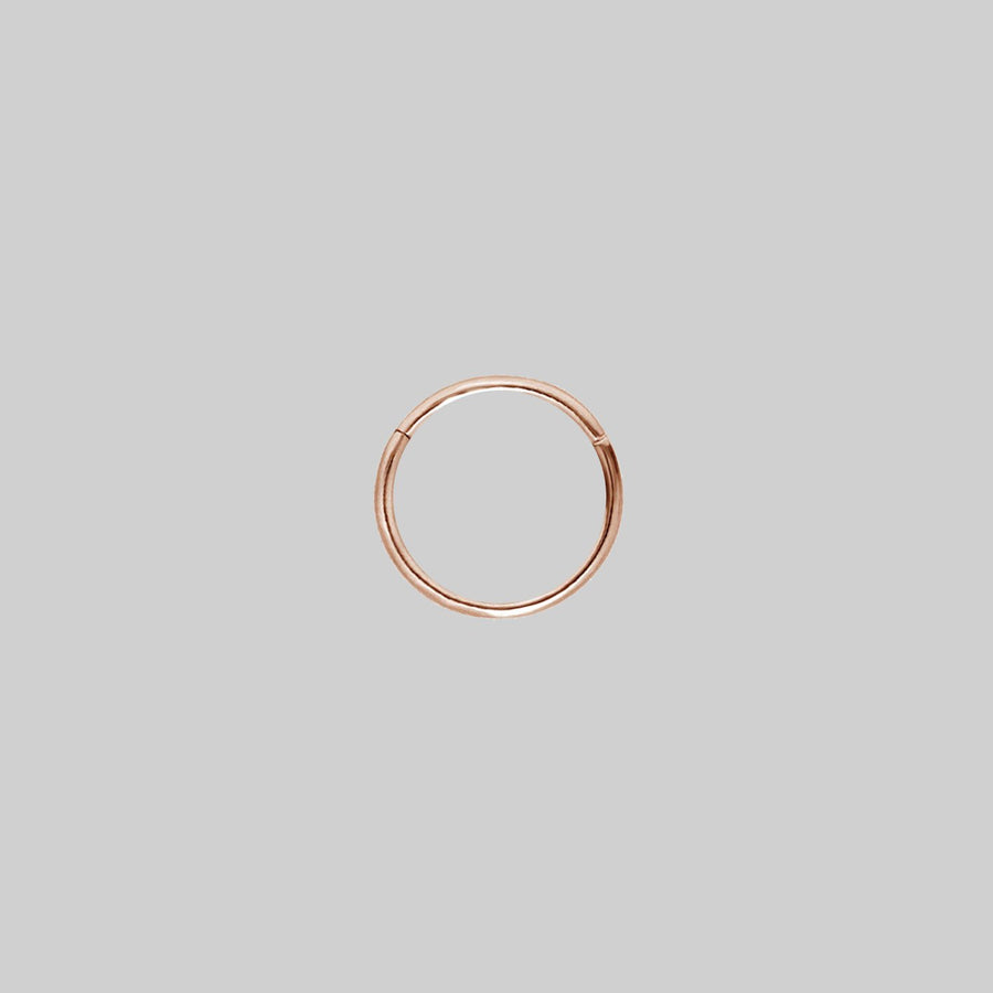 SASHA. Rose Gold Titanium Clicker Ring A simple rose gold clicker ring 10mm x 1mm