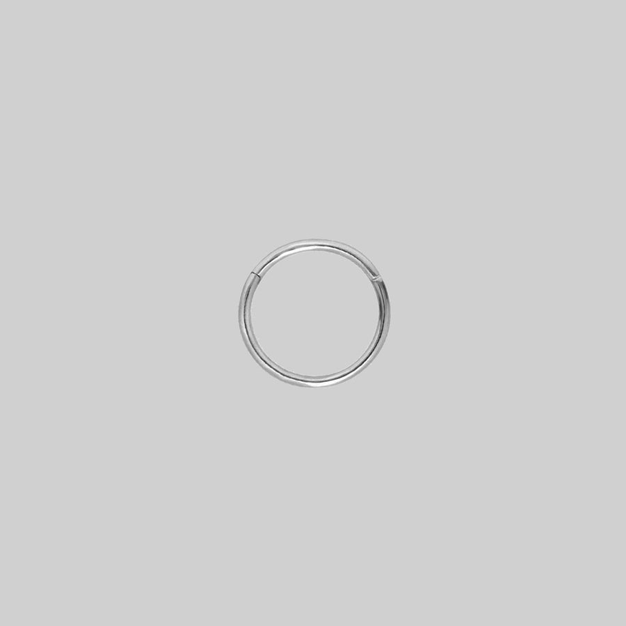 MIA. Silver Titanium Clicker Ring A simple, seamless silver clicker piercing 10mm x 1mm