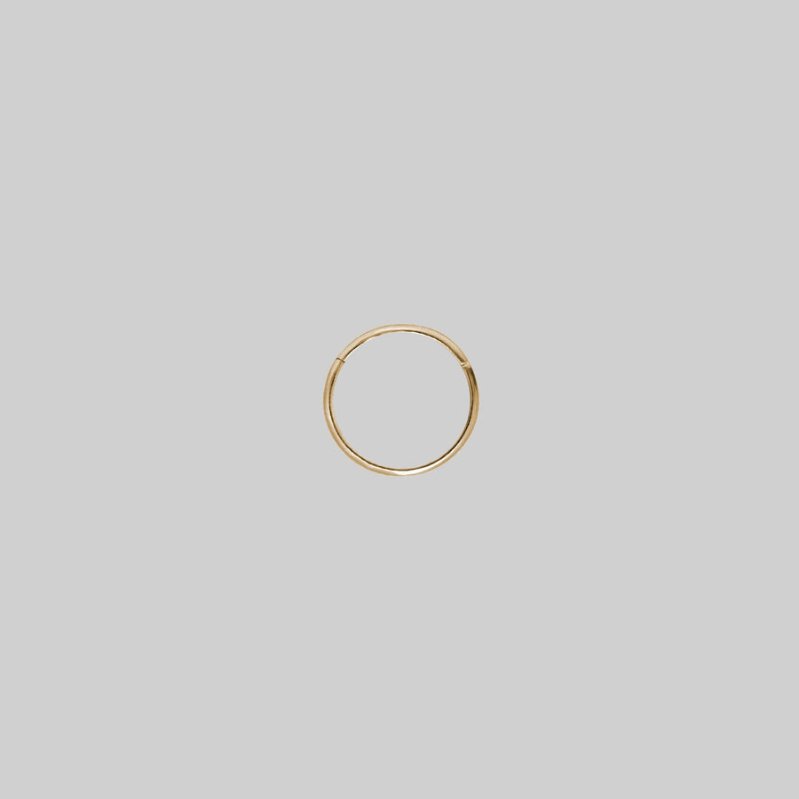 LARA. Gold Titanium Clicker Ring