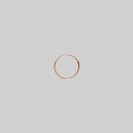 SASHA. Rose Gold Titanium Clicker Ring