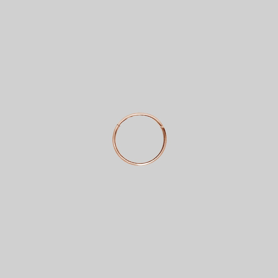 SASHA. Rose Gold Titanium Clicker Ring