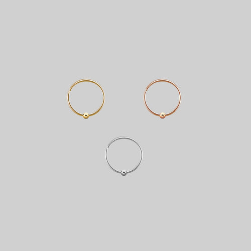 CLEO. Circular Barbell Ring - Silver