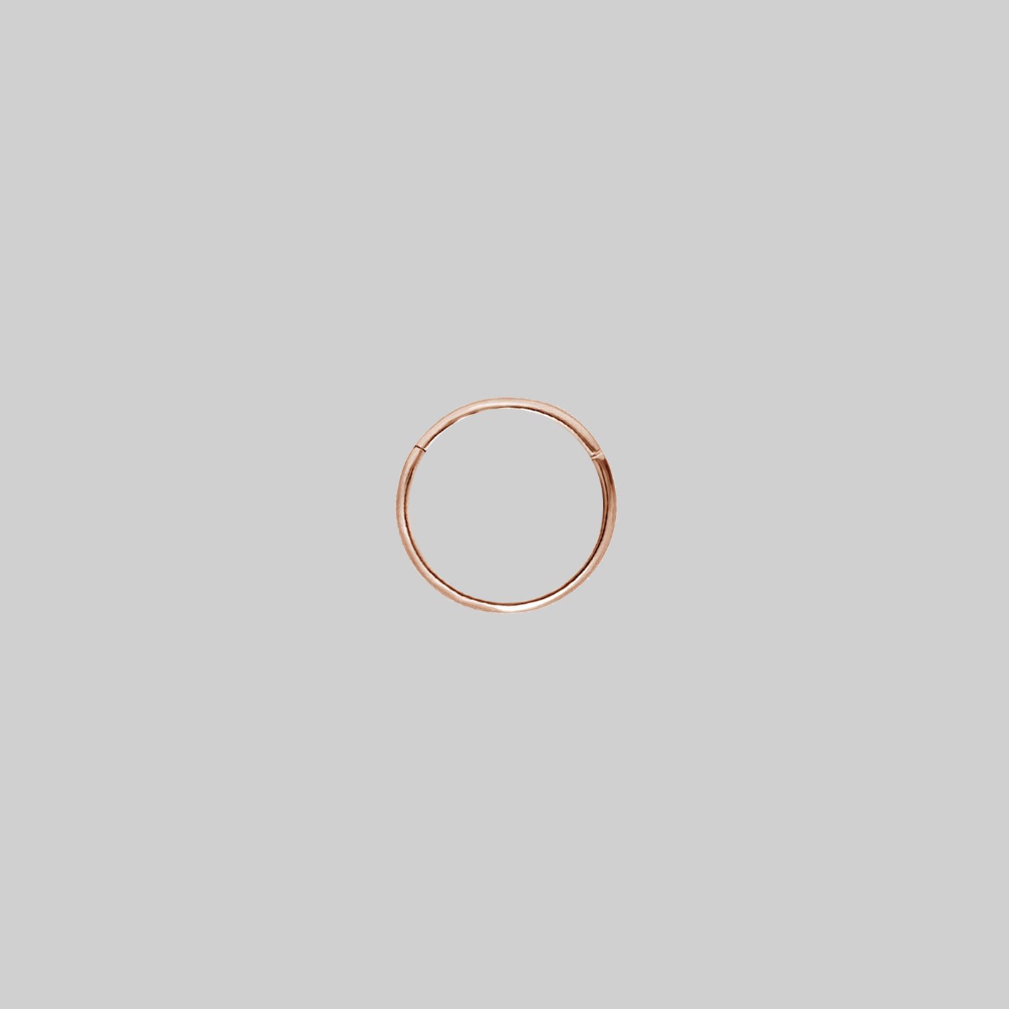 A simple rose gold clicker ring 8mm x 0.8mm