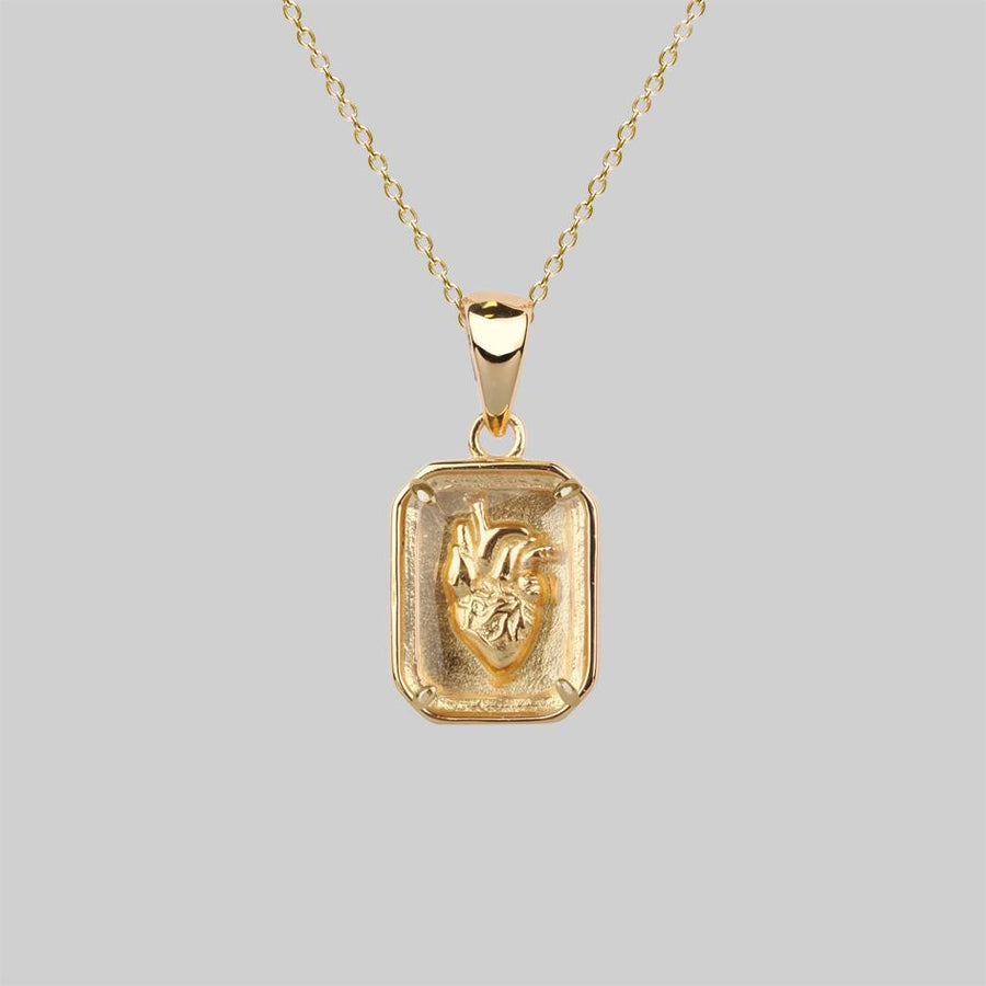 Gold plated 3D detailed anatomical heart under glass necklace