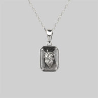 Silver heart under glass necklace