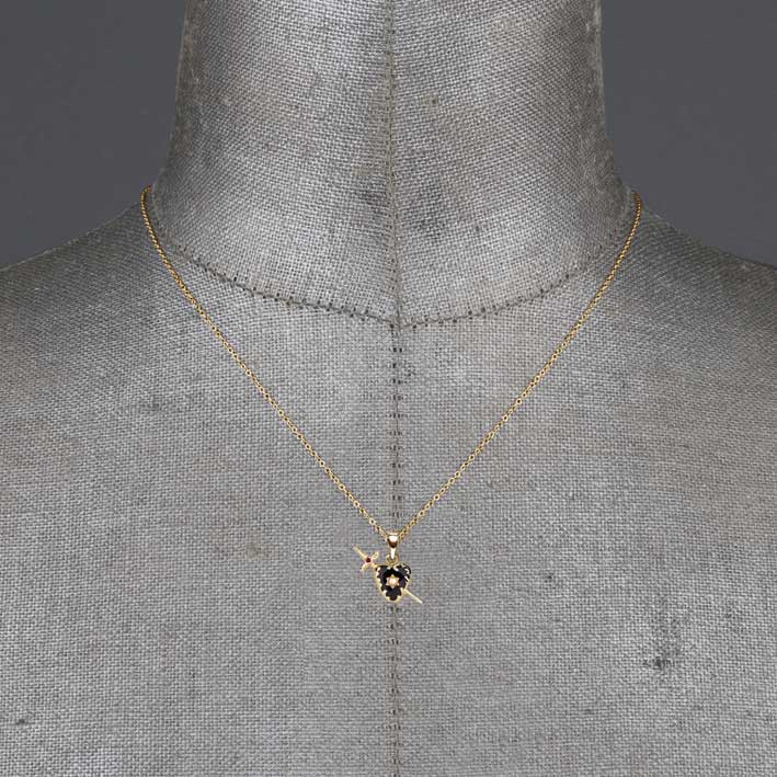 DEVOTION. Black Heart & Sword Gold Necklace Black heart and dagger necklace