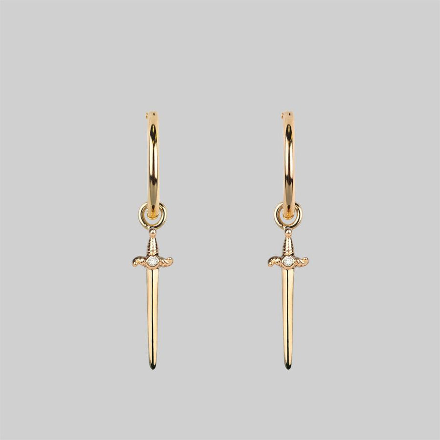 BETRAYAL. Cubic Zirconia Dagger Hoop Earrings - Gold