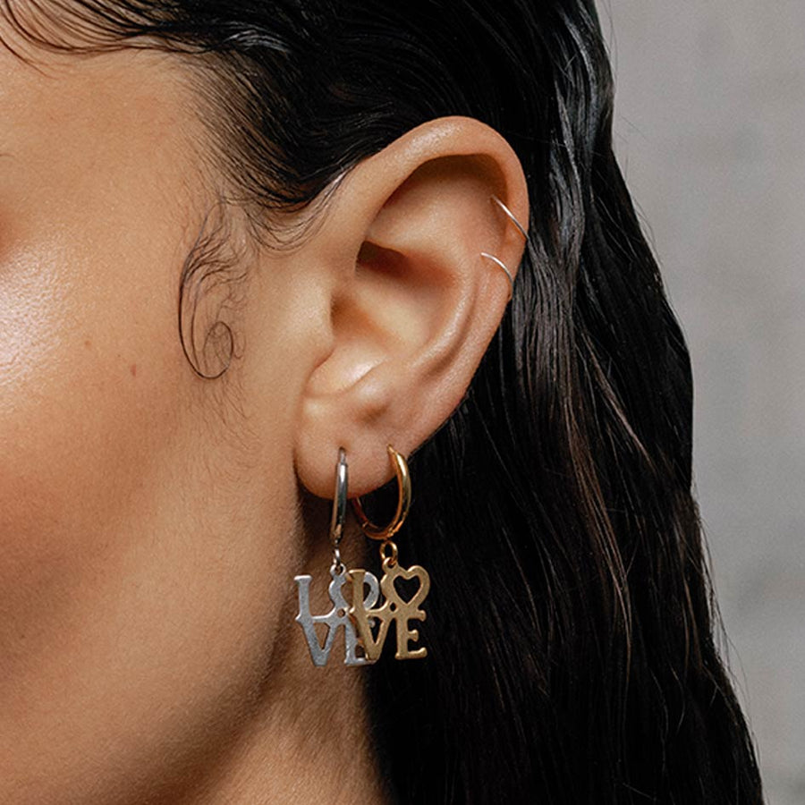Make Love Not War Hoop Earrings - Gold Love word dangly earrings