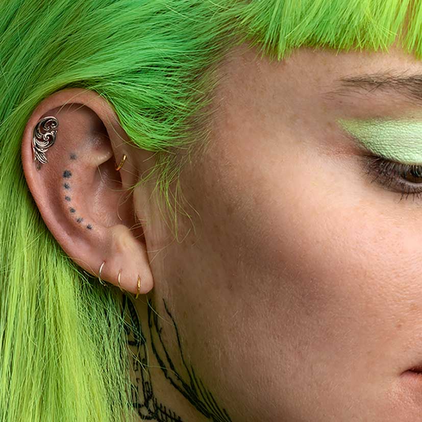 IMPERIAL. Ornate Flourish Stud Earring - Silver Scroll detailed cartilage piercing earring