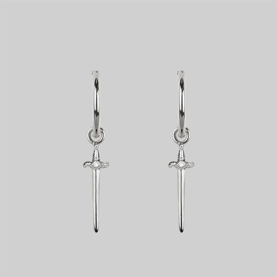BETRAYAL. Cubic Zirconia Dagger Hoop Earrings - Silver